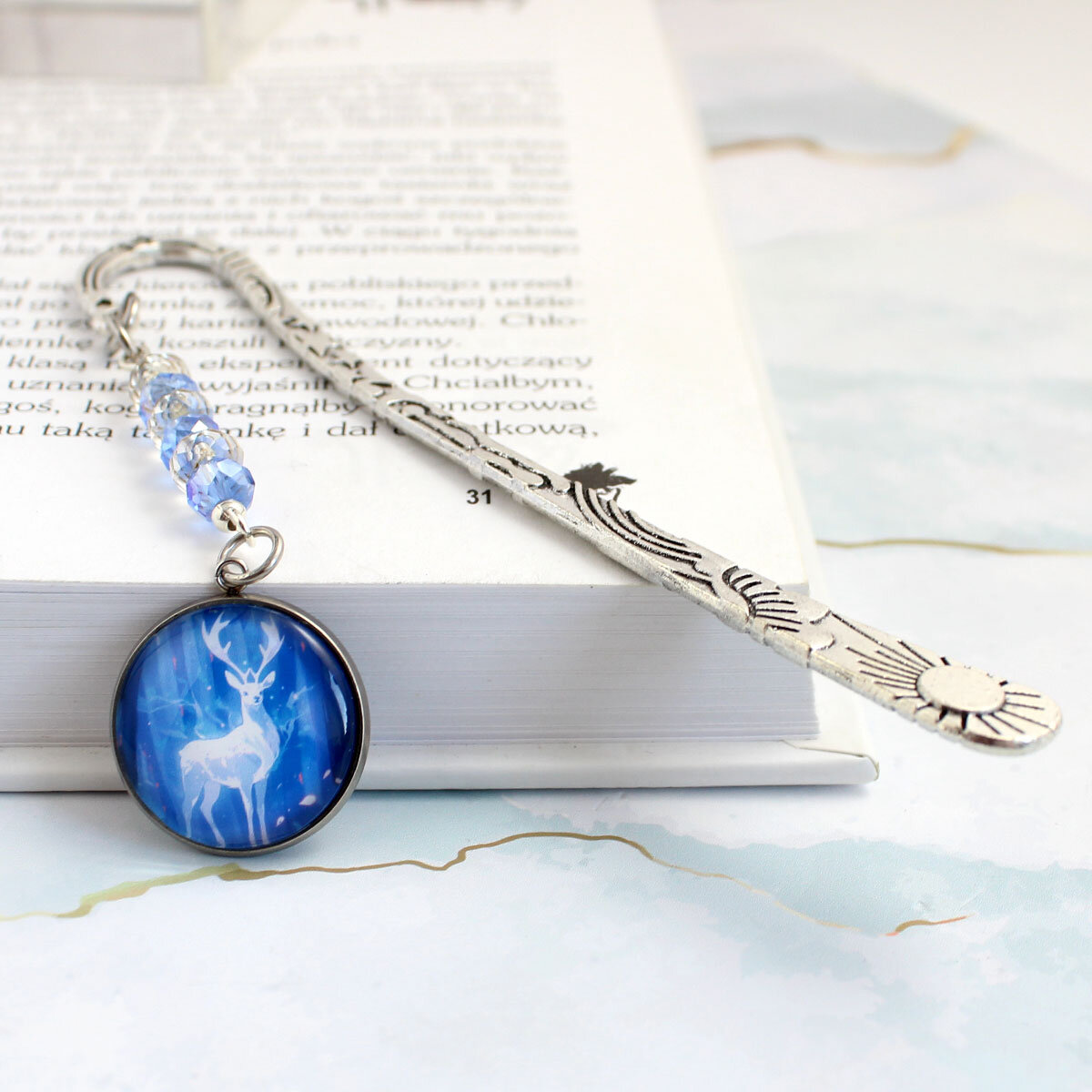 Zakładka do książki z motywem Harry’ego Pottera – Patronus jelen Zakładka do książki Harry Potter patronus jelen kryształki
