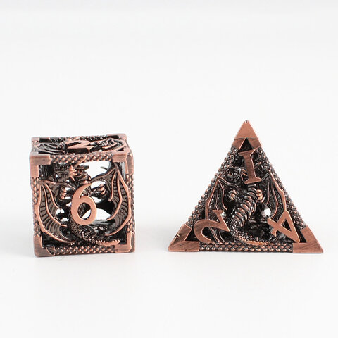 Metalowe ażurowe kości RPG z motywem smoków w kolorze oksydowanej miedzi | Kości Metalowe Dragon's Breath Hollow Lume Design