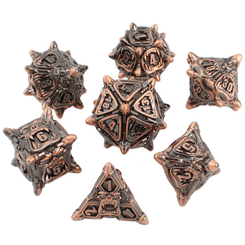 Metalowe kości RPG z motywem twarzy Orków i kolcami w kolorze miedzi | Kości Metalowe Orc Warband Lume Design