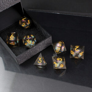 Kości RPG żywiczne Liquid Core czarne złote D&D Sharp Edge 7 szt