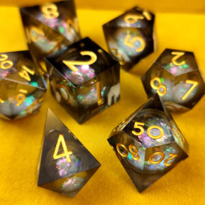 Kości RPG żywiczne Liquid Core czarne złote D&D Sharp Edge 7 szt