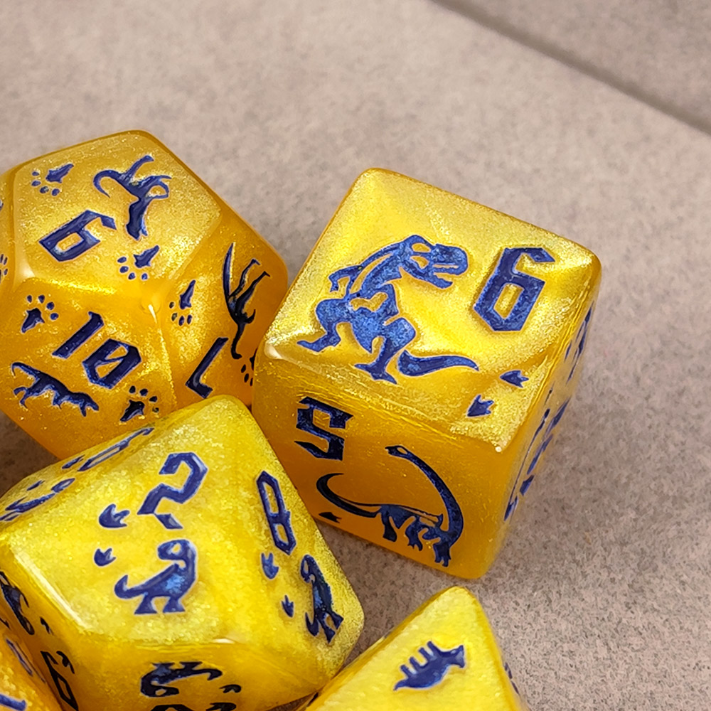 Kości RPG akrylowe dinozaury żółte D&D zestaw 7 szt. woreczek