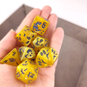 Kości RPG akrylowe dinozaury żółte D&D zestaw 7 szt. woreczek