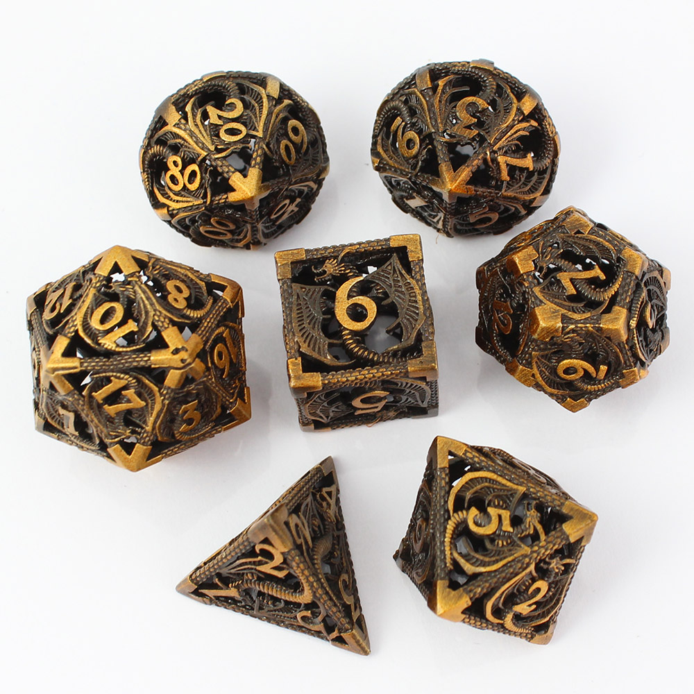 Kości RPG metalowe ażurowe smoki złote D&amp;D zestaw 7 szt. pudełko