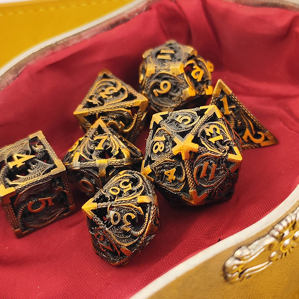 Kości RPG metalowe ażurowe smoki złote D&amp;D zestaw 7 szt. pudełko