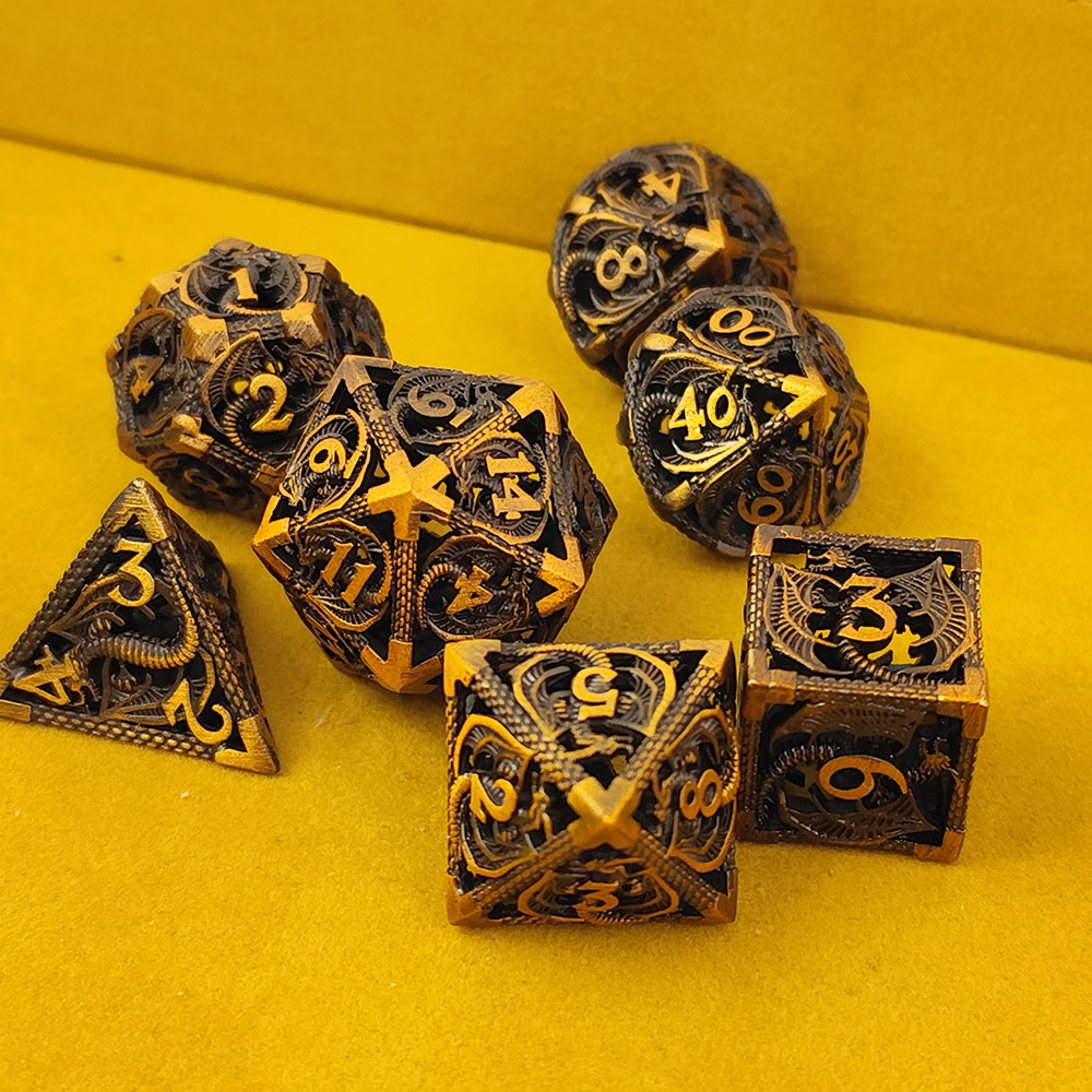 Kości RPG metalowe ażurowe smoki złote D&amp;D zestaw 7 szt. pudełko