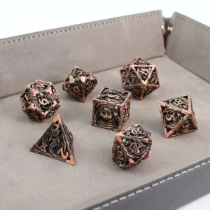 Metalowe ażurowe kości RPG z motywem smoków w kolorze oksydowanej miedzi | Kości Metalowe Dragon's Breath Hollow Lume Design