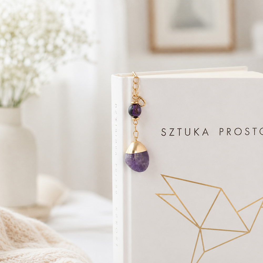 Elegancka złota zakładka do książki z ametystem i agatem w formie pióra.